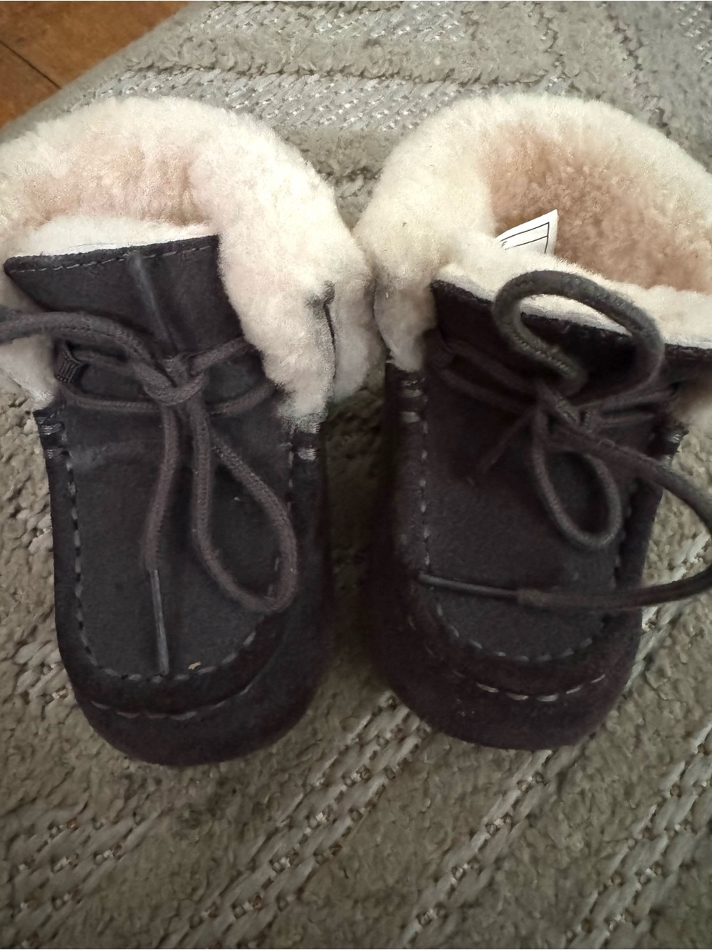 UGG Kids Dark Brown Suede Moccasin Slippers with Shearling Trim